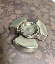 Keturi button