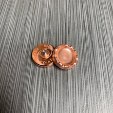 Keturi button